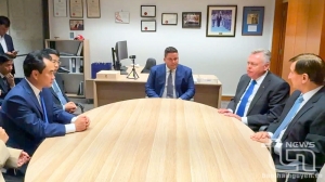 Exchanging and promoting cooperation on green growth and clean energy in Australia